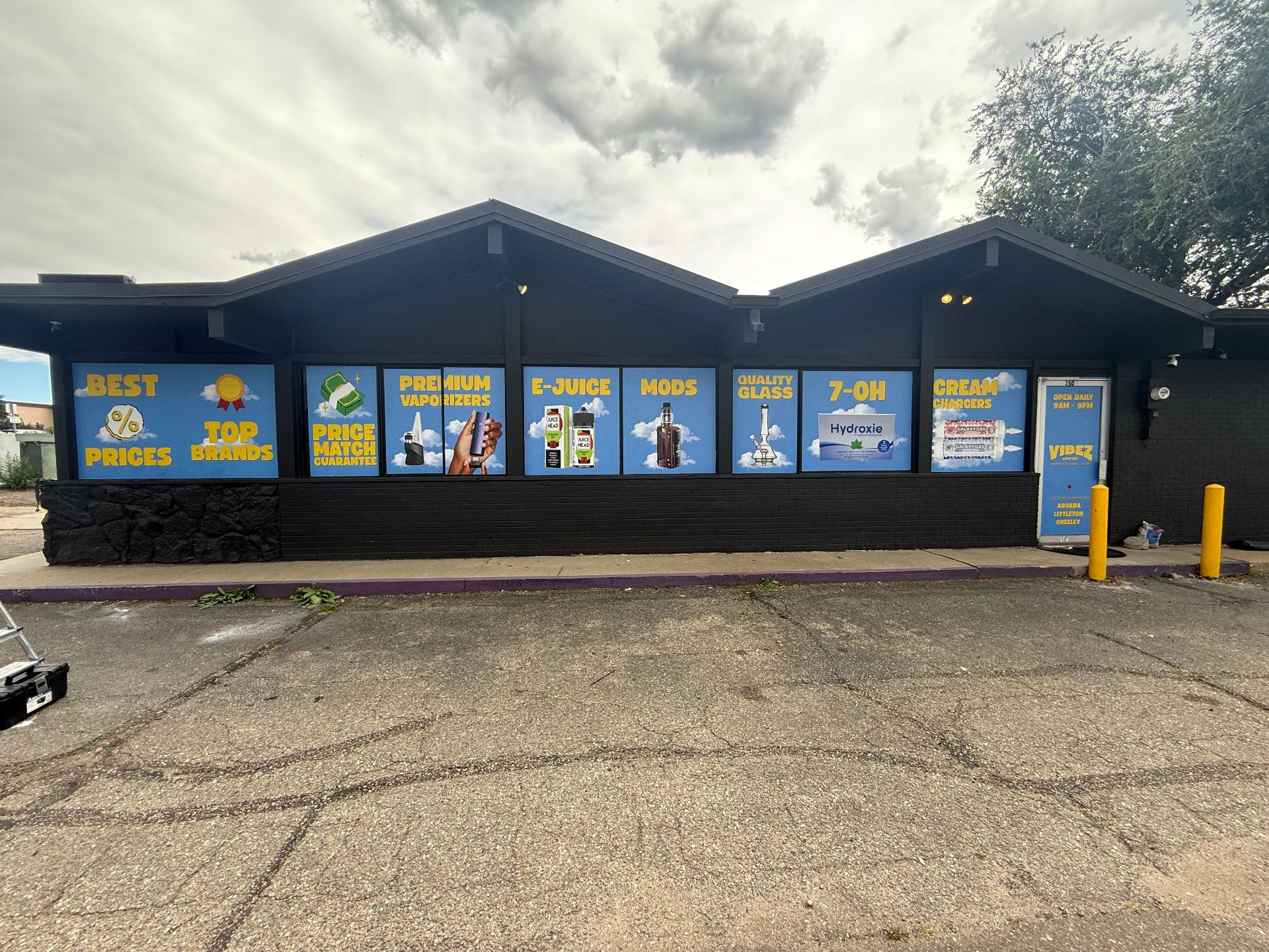 Printed graphics installed across a Colorado retail storefront